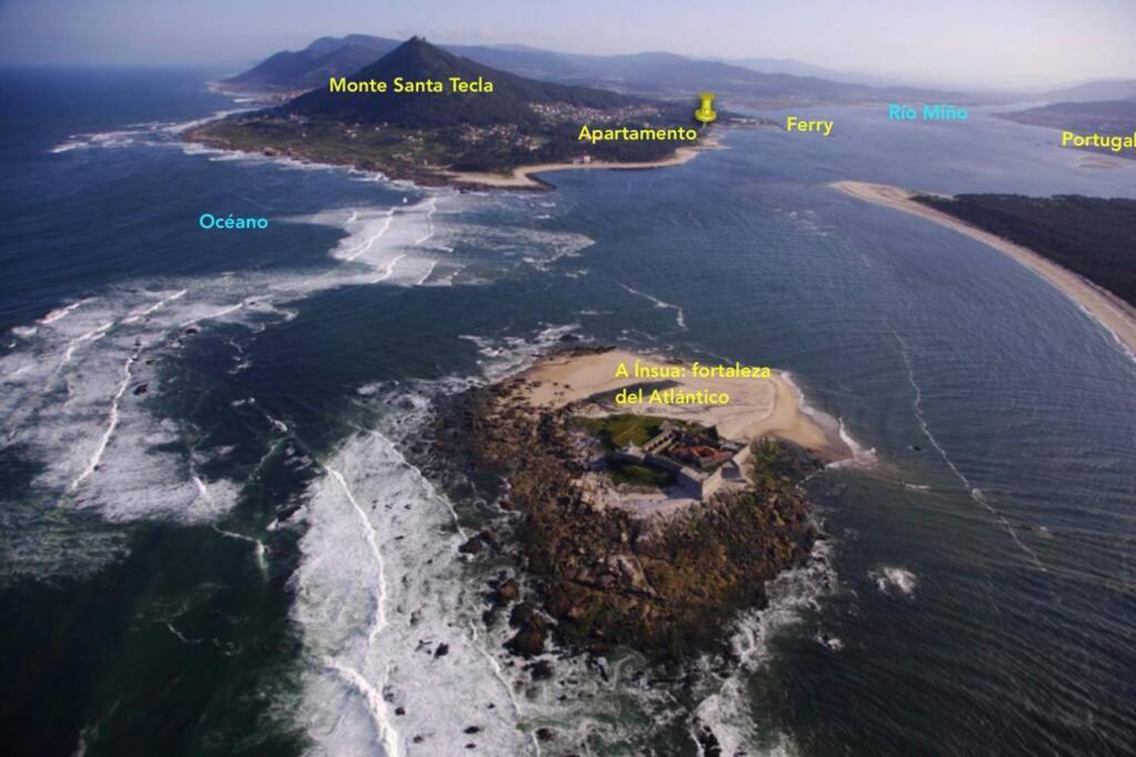 Apartamento en primera línea de playa A Guarda Exterior foto